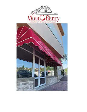 Дизайн на външна реклама и брандирана червена тента за WildCherry на главния път